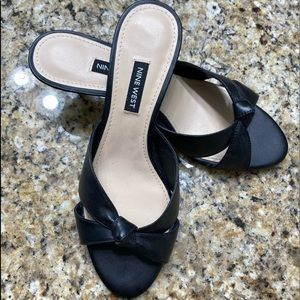 Black 9 West 2 inch kitten heel sandal.